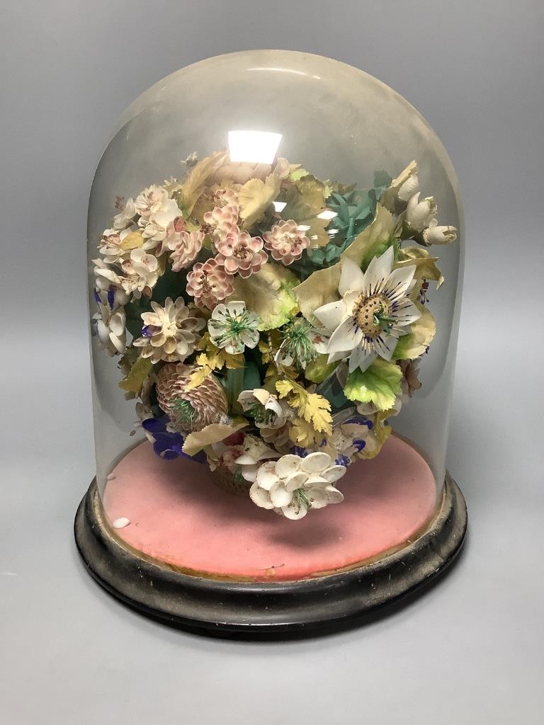 A Victorian floral shell display under dome, height 34cm